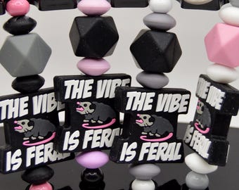 The Vibe is Feral Keychain, possum, steel, soft beads, wild, crazy, spontaneous
