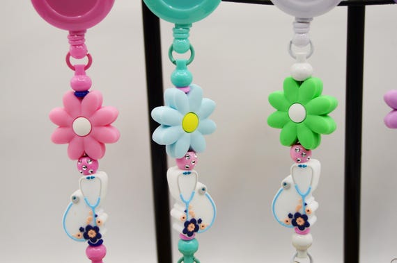 Flower and Stethoscope badge holder, reel up to 30 inches, medical staff, hospital