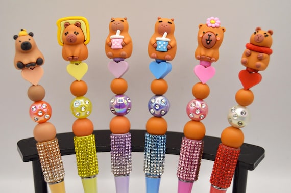Capybara topper pens, bling, refills included