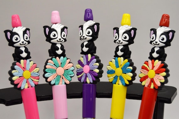 Pretty Skunks on Pretty Flower pens, colorful, refillable