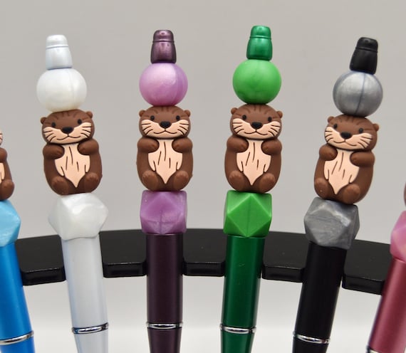 Otter Pens with hexagon, pearlescent silicone beads.