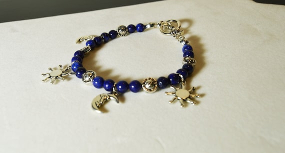Lapis Lazuli stone bracelet with silver plated suns, moons and stars charms. Celestial | Blue | Day or evening wear | Gift for him or her