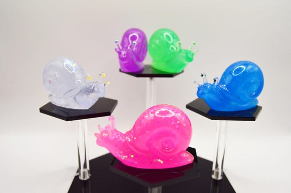 Glow-in-the-Dark Snail Figurine: Resin Art with Rhinestone Eyes