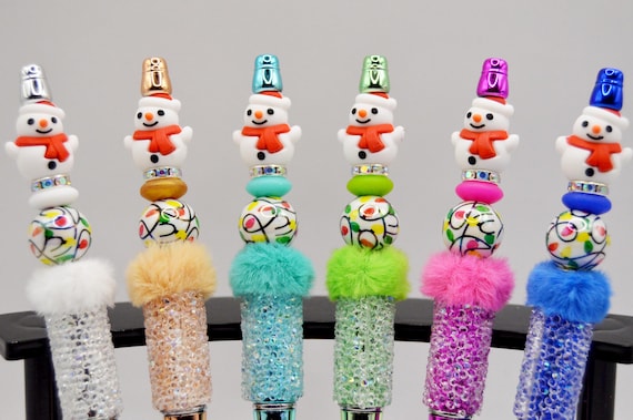 Sweet little Snowman pens in bright colors, refills included