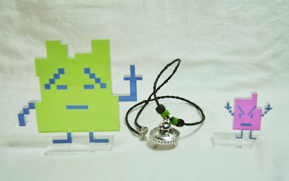 UFO Spaceship locket necklace. | Leather | Alien | Green | Black | Stash | Extra terrestrial | Robot | Science Fiction | Funny | Unique