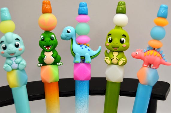 Dinosaur Pens that glow in the dark!