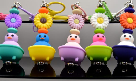 Rubber Ducky in a bath tub Key Chains.