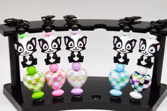 Cute little Skunk and Hart Key Chains, soft, steel, silicone, great gift