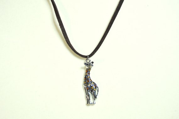 Giraffe pendant necklace. | Leather | Zoo | Animal | Minimal | Sued | Crystal | Brown | Orange | Dark silver