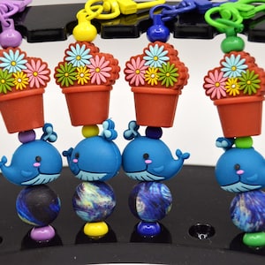 Llavero de ballena y maceta, autoestopista, galaxia, divertido, guía, improbable, espacio, ciencia ficción