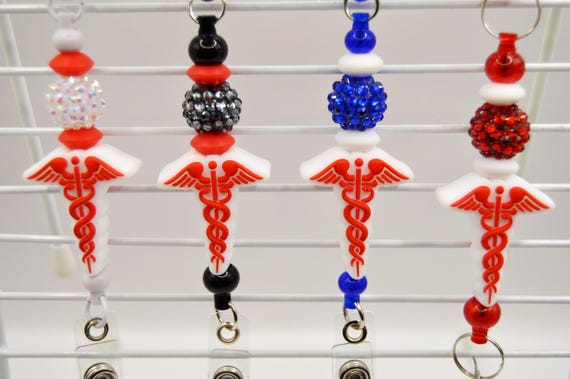 Caduceus, Medical Symbol reel badge holder.