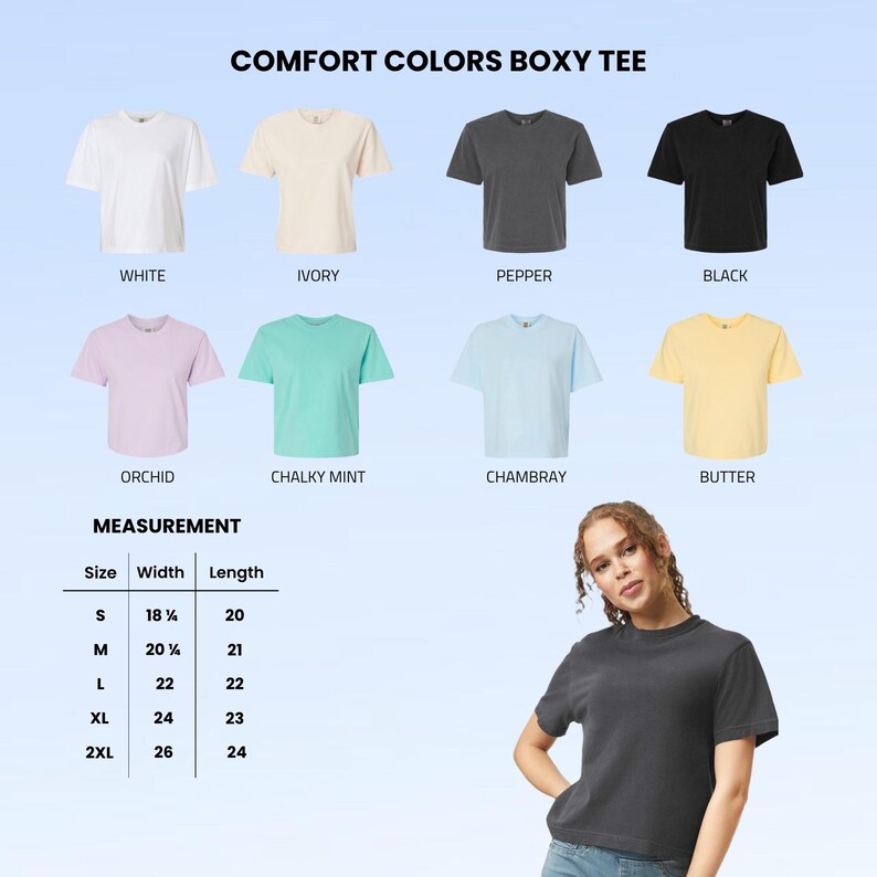 May include: A display of Comfort Colors Boxy Tees in various colors: white, ivory, pepper, black, orchid, chalky mint, chambray, and butter. Measurements are provided for sizes S to 2XL, with widths ranging from 18 1/8 to 26 inches and lengths from 20 to 24 inches.