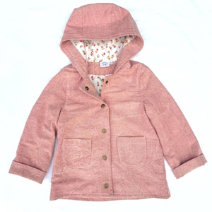 May include: A dusty rose-colored jacket with a hood and button closure. The jacket features two front pockets and a floral print lining inside the hood and collar. The sleeves are cuffed at the wrists.