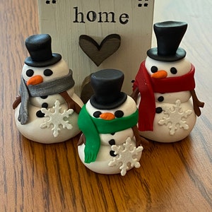 Handmade miniature snowmen with Snowflake brads