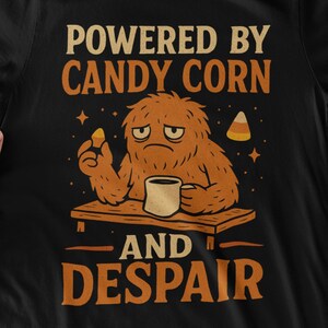 Powered by Candy Corn T-Shirt | Funny Halloween Meme Tee | Candy Lover Gift