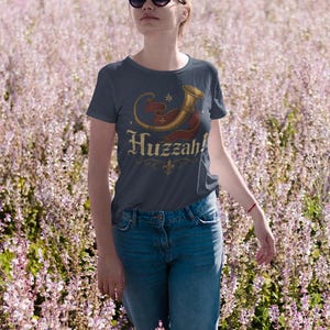 Renaissance fair cosplay Huzzah tee for geeky fantasy and festival lovers.