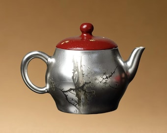 Tetera de cerámica artesanal con diseño de flor de ciruelo bañada en plata y oro, 123 ml.