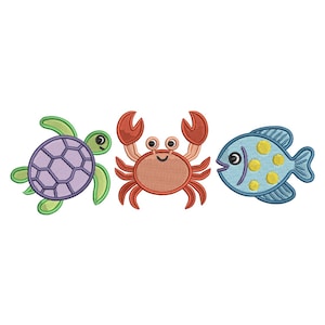 May include: An embroidered design featuring a purple and green turtle, a red crab, and a blue fish with yellow spots. The sea creatures are depicted in a cartoon style, perfect for children's crafts or nautical-themed projects.