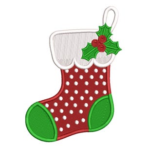 May include: Embroidered Christmas stocking in red with white polka dots, a green toe and heel, and a white scalloped cuff. A sprig of green holly with red berries is at the top. The stocking has a white loop for hanging.