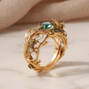 Forest ring with a green stone.Cooper womens jewelry.