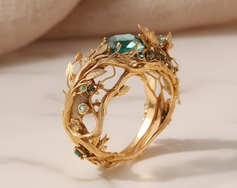 Forest ring with a green stone.Cooper womens jewelry.