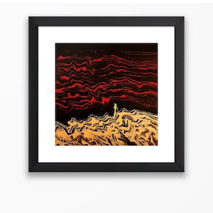 May include: Abstract art print in a black frame. The artwork features a black background with red, wavy lines at the top and a golden, marbled design at the bottom. A small, silhouetted figure stands on the golden area.