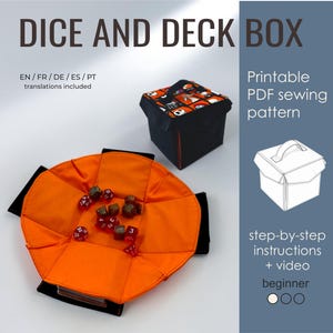 May include: A dice and deck box sewing pattern featuring a black and orange fabric box with a lid and a flat, circular orange fabric dice tray containing several multi-sided dice. Text includes DICE AND DECK BOX, Printable PDF sewing pattern, and step-by-step instructions + video.