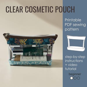 May include: Clear cosmetic pouch filled with beauty products. The pouch has a clear body with a patterned top and bottom trim. The text "CLEAR COSMETIC POUCH" is at the top. A side panel advertises a printable PDF sewing pattern with instructions and a video tutorial.