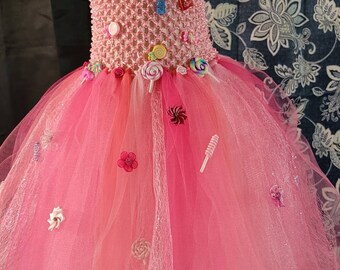 Pretty in pink candy and flower tutu dress. Fits size 3T-5T