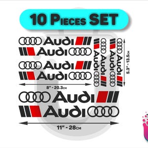 Può includere: Un set di 10 adesivi con il logo Audi neri e rossi. Gli adesivi variano di dimensioni, il più grande misura 28 cm di larghezza. Il set include il logo Audi e la scritta "Audi".
