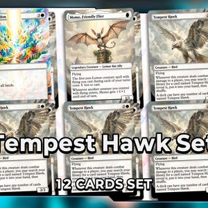 May include: A set of 12 Magic: The Gathering cards, including "Tempest Hawk" and "Armageddon" cards. The cards feature fantasy art and text descriptions. The words "Tempest Hawk Set" and "12 CARDS SET" are displayed.