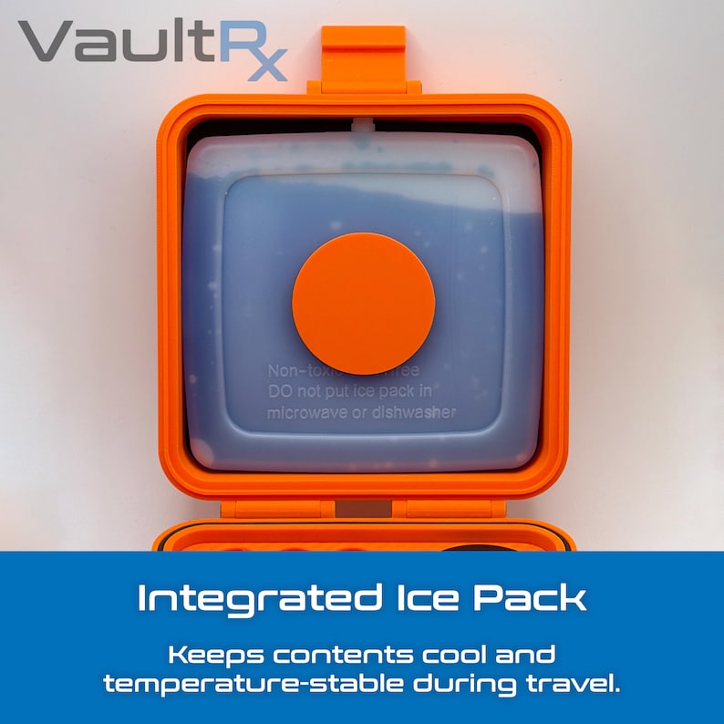 May include: An orange, rectangular container with a blue ice pack inside. The container has a circular orange accent and the text "VaultRx" at the top. The text "Integrated Ice Pack" and other text are at the bottom.
