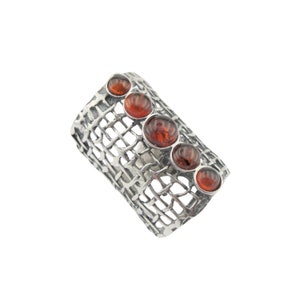 Wide nest Band Sterling Silver Ring made of Amber Gemstone 
Meticulously handcrafted in Israel for exceptional quality. Each piece is made to order with meticulous attention to detail.