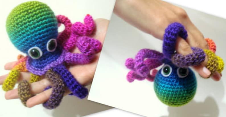 May include: A rainbow colored crocheted octopus with large googly eyes. The octopus has eight tentacles, each a different color.
