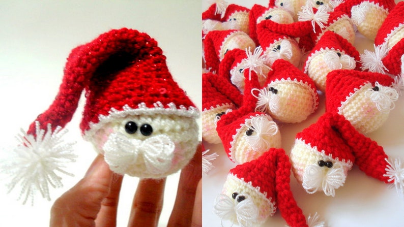 Op de afbeelding: Een groep gehaakte kerstman-versieringen met witte baarden en rode mutsen. De versieringen zijn gemaakt van wit en rood garen.