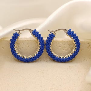 28 mm. Hoop earrings with silver and matte dark blue beads. A wonderful handmade gift for you, your mom, sister or best friend.