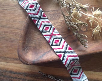 Wide beaded bracelet with geometric pattern