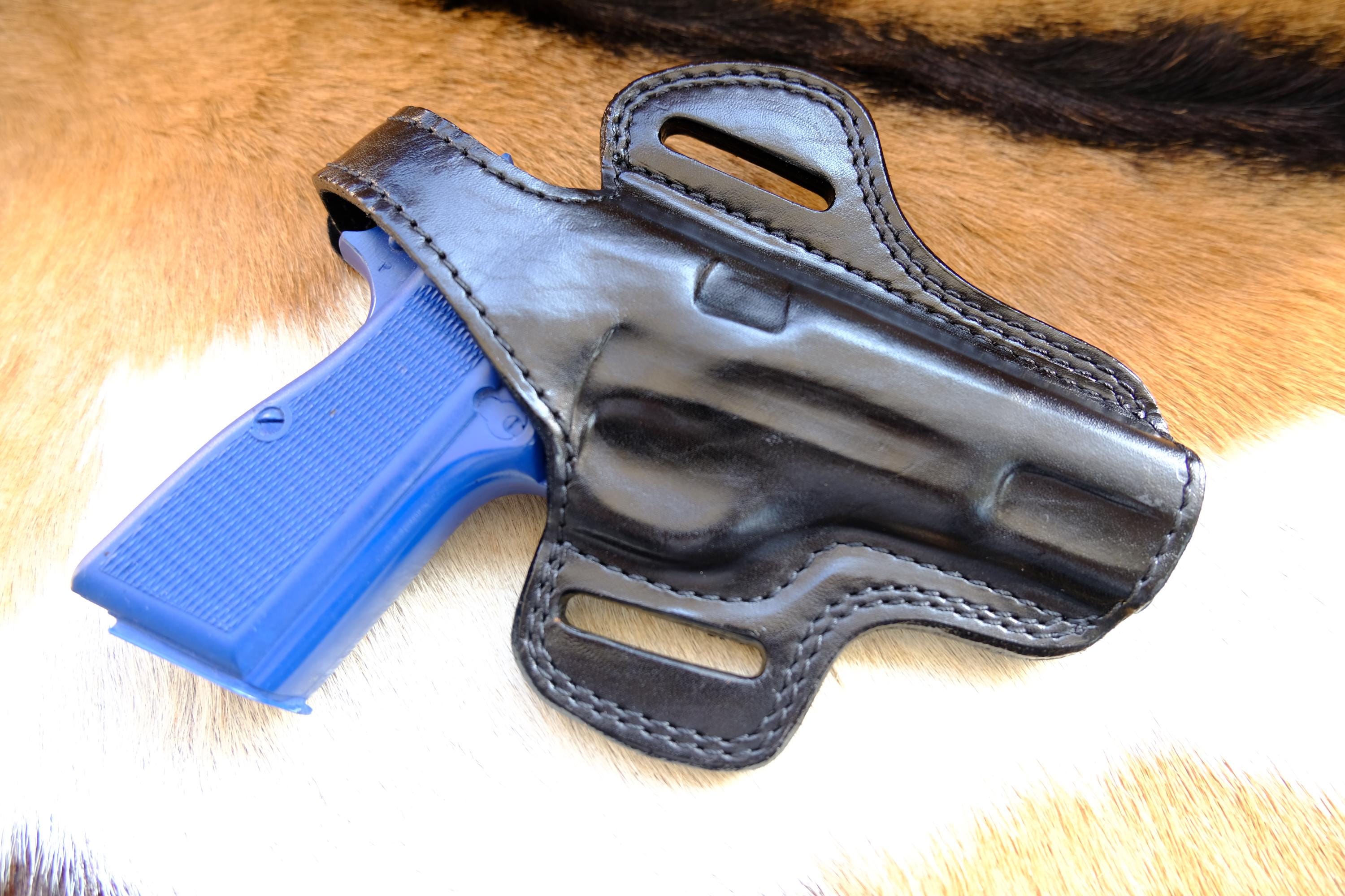 thumbnail interactive-video image 1 of AKAR OWB Leather Belt Holster For Browning Hi-Power – Thumb Break – Right Or Left Hand 1 of 4