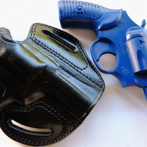 Coldre externo de couro com trava de polegar: Ruger SP101 .357 Magnum com cano de 3" imagem 11