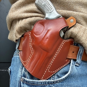 Coldre externo de couro com trava de polegar: Ruger SP101 .357 Magnum com cano de 3" imagem 8