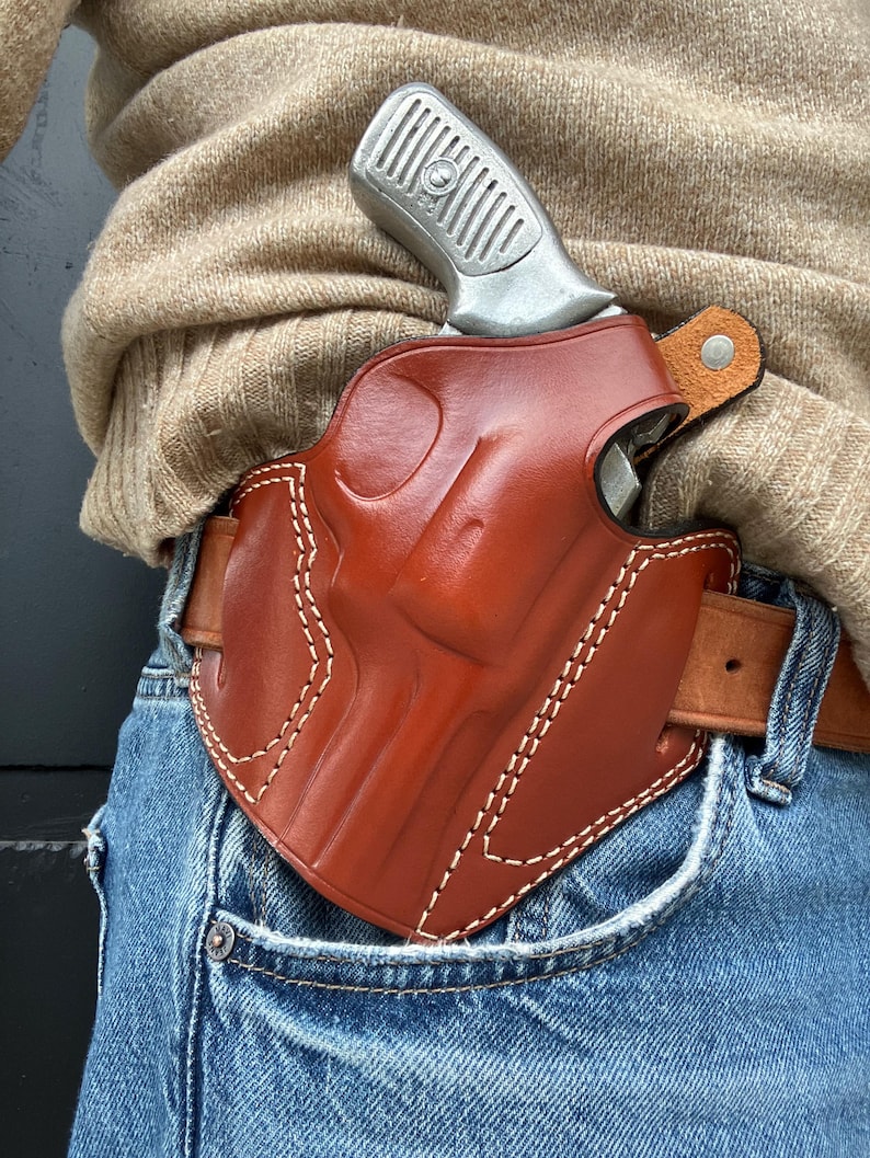 Coldre externo de couro com trava de polegar: Ruger SP101 .357 Magnum com cano de 3" imagem 8