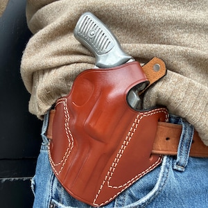 Coldre externo de couro com trava de polegar: Ruger SP101 .357 Magnum com cano de 3" imagem 1