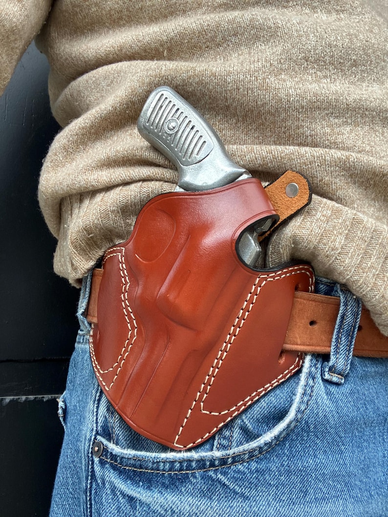 Coldre externo de couro com trava de polegar: Ruger SP101 .357 Magnum com cano de 3" imagem 1