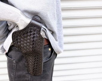 Funda de cuero con cierre de pulgar y diseño de tejido de cesta: S&W 686, Colt Python, Ruger GP100 (cañón de 4 pulgadas)