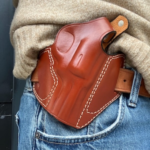 Coldre externo de couro com trava de polegar: Ruger SP101 .357 Magnum com cano de 3" imagem 5