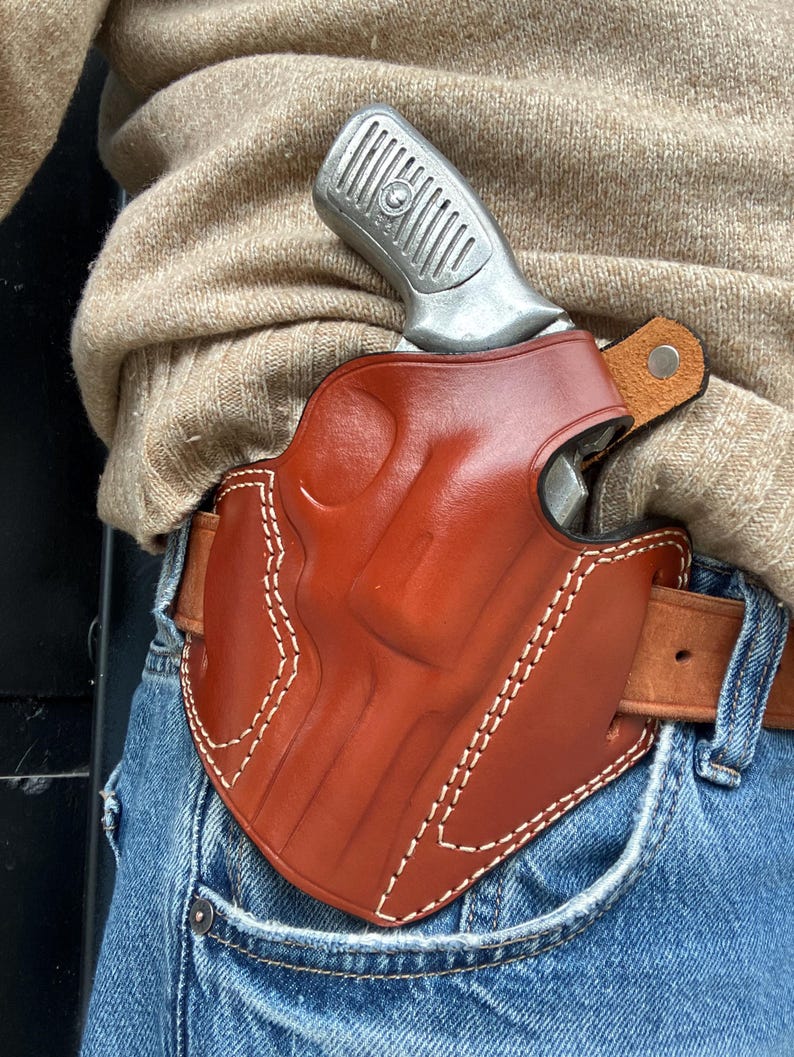 Coldre externo de couro com trava de polegar: Ruger SP101 .357 Magnum com cano de 3" imagem 9