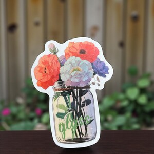 Pink white and purple flower in a mason jar sticker