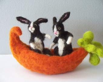Two Dutch Rabbits in a Carrot Canoe Needle felted Rabbits in a boat