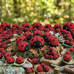 May include: A collection of handmade crochet ladybugs in various sizes. The ladybugs are primarily red with black spots and heads. Some are arranged on leaves and moss, creating a whimsical, nature-inspired display. The background is a blurred forest scene.