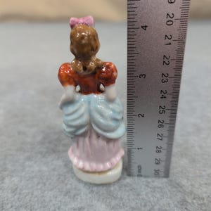 Vintage Porcelain Victorian Lady Figurine Japan Woman Dress Bow Hair Collectible image 3